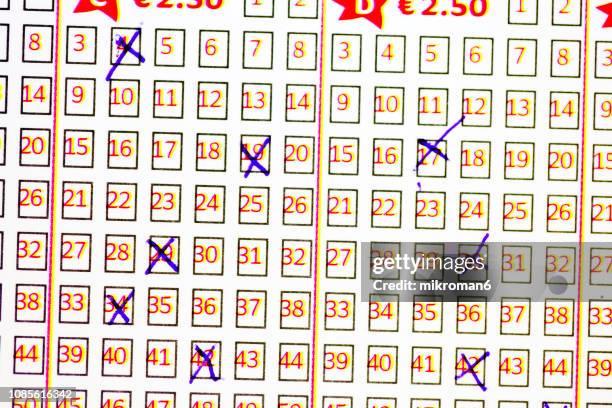 pen markings on lottery ticket. filled in lottery ticket - bookmakers stock pictures, royalty-free photos & images