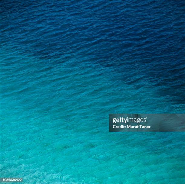 view of a sea - blue sea photos et images de collection