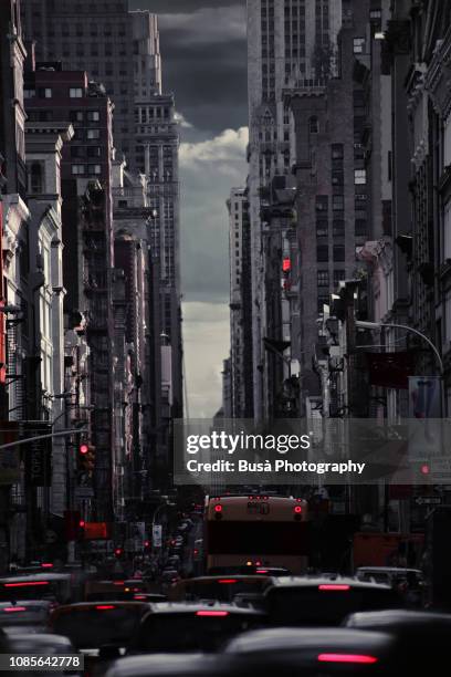 digitally manipulated image of heavy car traffic on broadway, lower manhattan, new york city - conflict minerals stock pictures, royalty-free photos & images