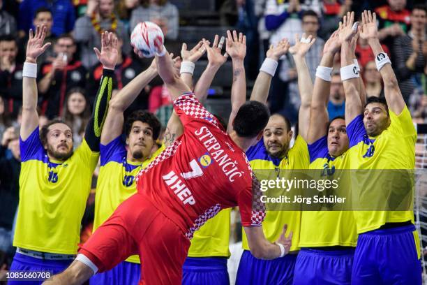 Luka Stepancic of Croatia with a free throw attemp against Fabio Chiuffa, Jose Toledo, Henrique Teixeira, Vincius Teixeira and Felipe Borges of...