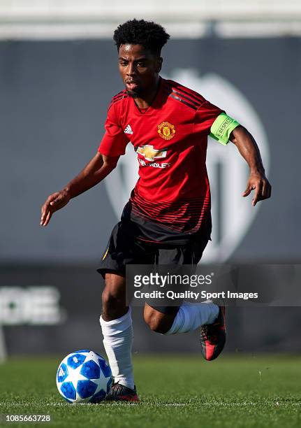 Angel Gomes of Manchester United runs with the ball during the UEFA Youth League match between Valencia and Manchester United at Paterna Training...