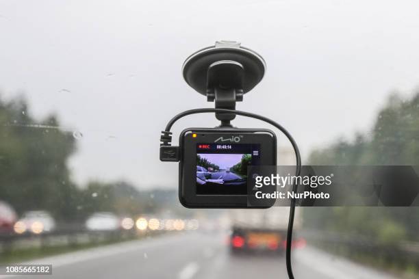 Mio dash cam mounted in car is seen in Gdansk, Poland on 14 August 2018 Sales of car cameras is growing in Poland. Experts say that popularity of...