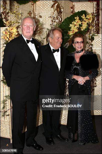 Prince Victor Emmanuel of Savoy, Massimo Gargia and SAR Princess Marina of Savoy in Paris, France on December 08th , 2004.