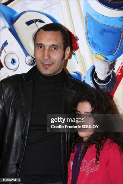 Zinedine Soualem with his daughter Mouna in Paris, France on March 29, 2005.