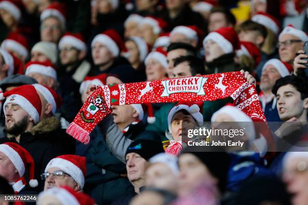 Merry Christmas" club scarf is displayed by a Southampton fan during the Premier League match between Huddersfield Town and Southampton FC at John...
