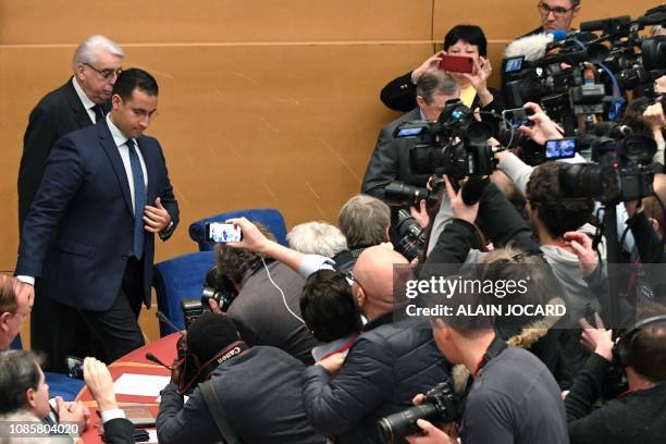 Former Elysee senior security officer Alexandre Benalla , flanked by Senator and commisision speaker Jean-Pierre Sueur , is surrounded by journalists...