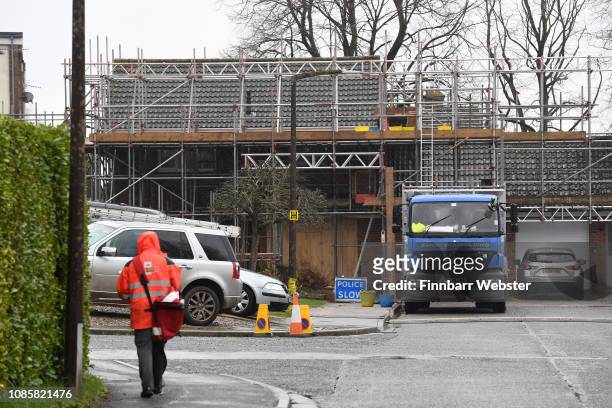 Contractors work on the roof of former Russian spy Sergei Skripal's home in the wake of the Novichok attack on him and his daughter Yulia in March...
