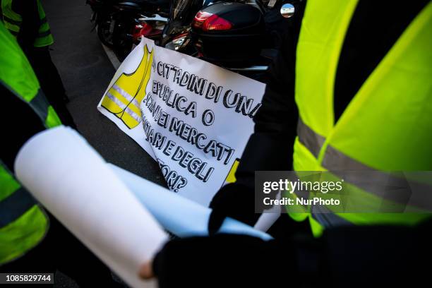 First meeting of Gilet Gialli in Milan, Italy, on 21 January 2019 in front of the Italian headquarter of Goldman Sachs. Few people gatherings and...