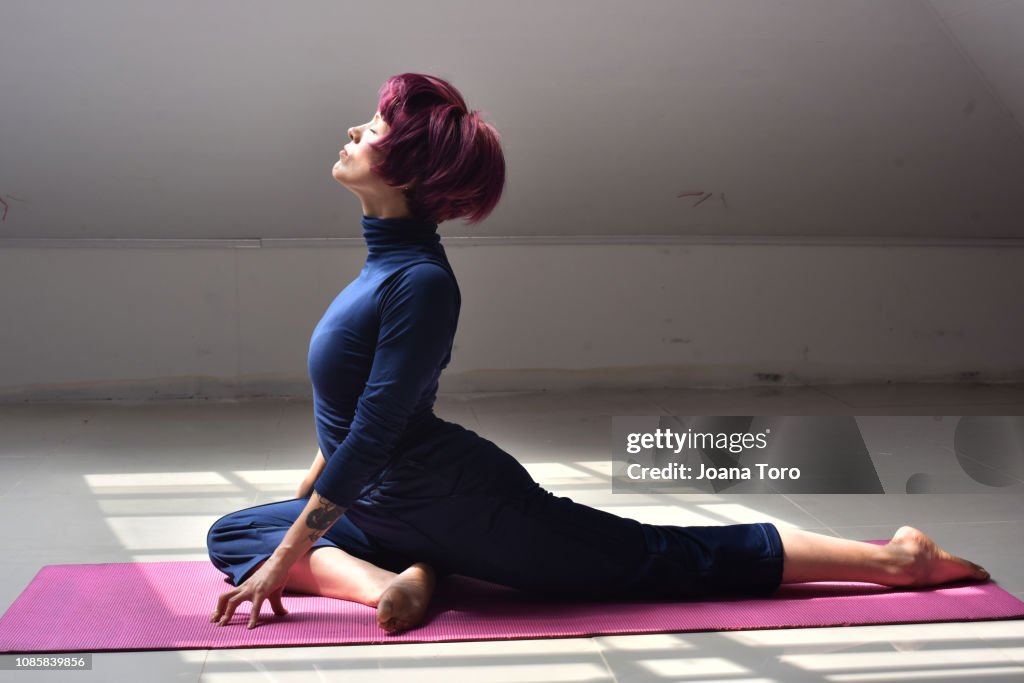 Middle age woman practicing yoga