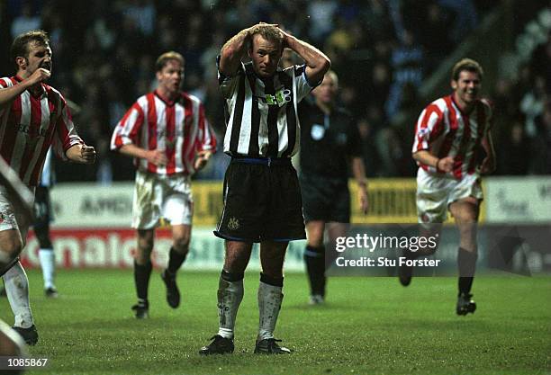 Dejected Alan Shearer of Newcastle after having his penalty saved by Thomas Sorensen of Sunderland during the Premiership game between Newcastle...