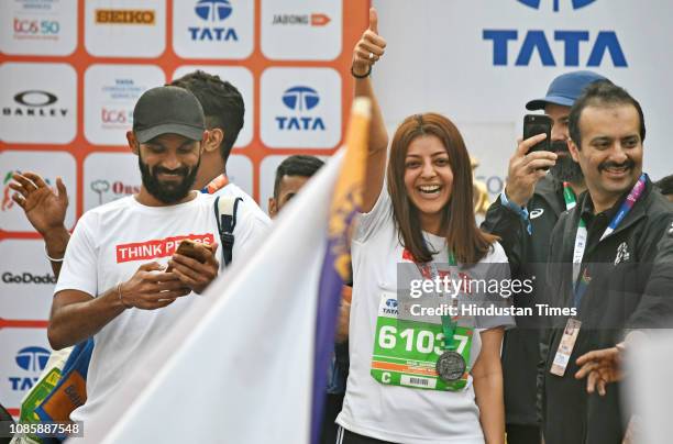 Kajal Agarwal cheer up participants TATA Mumbai Marathon 2019 outside CST station on January 20, 2019 in Mumbai, India.