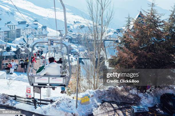 view of sierra nevada in a sunny day from a chairlift (with a lot of snow) - sierra nevada spain ski photos et images de collection