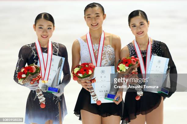 Rika Kihira , Kaori Sakamoto and Satoko Miyahara pose with their medals after the ladies free skating during day three of the 87th Japan Figure...