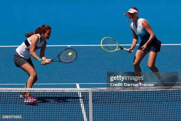 Mary Joe Fernandez of the United States plays a forehand in her Women's Legends Doubles match with Barbara Schett of Austria against Martina...