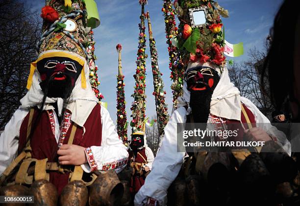 Bulgarian dancers known as a "kukeri" attend a ritual dance during the International Festival of the Masquerade Games in Pernik near the capital...