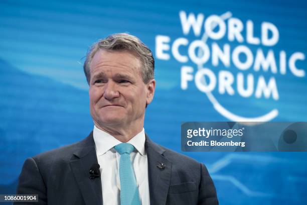 Brian Moynihan, chief executive officer of Bank of America Corp., reacts during a panel session on the opening day of the World Economic Forum in...