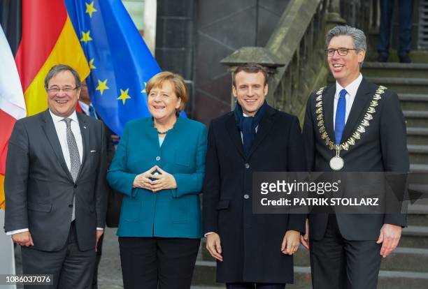 State Premier of North Rhine-Westphalia Armin Laschet, German Chancellor Angela Merkel, French President Emmanuel Macron and Aachen's mayor Marcel...