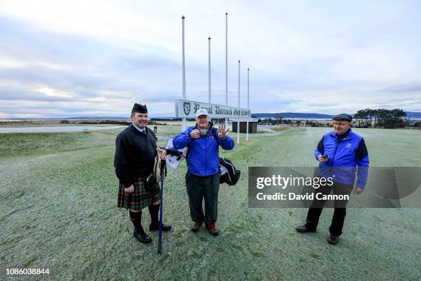 Nick Edmund of England arrives at Royal Dornoch Golf Club and is welcomed by Willie Mackay the vice-captain of Royal Dornoch Golf Club and a piper on...