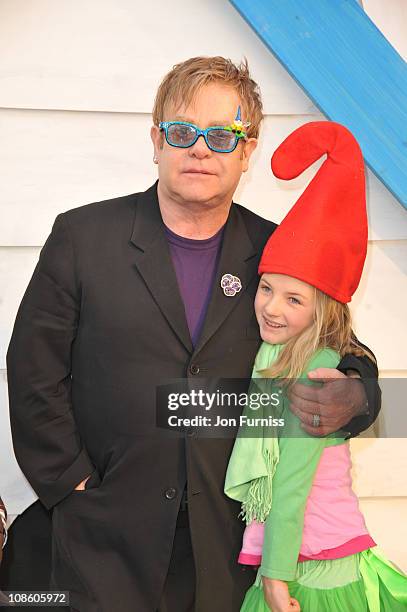 Executive producer Sir Elton John and David Furnish's goddaughter Esmie Bertlesen attend the "Gnomeo & Juliet" premiere at Odeon Leicester Square on...