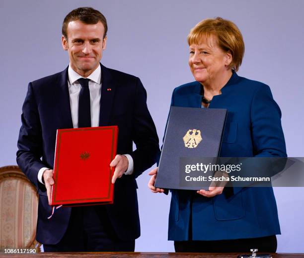 German Chancellor Angela Merkel and French President Emmanuel Macron sign the Aachen Treaty on January 22, 2019 in Aachen, Germany. The treaty is...