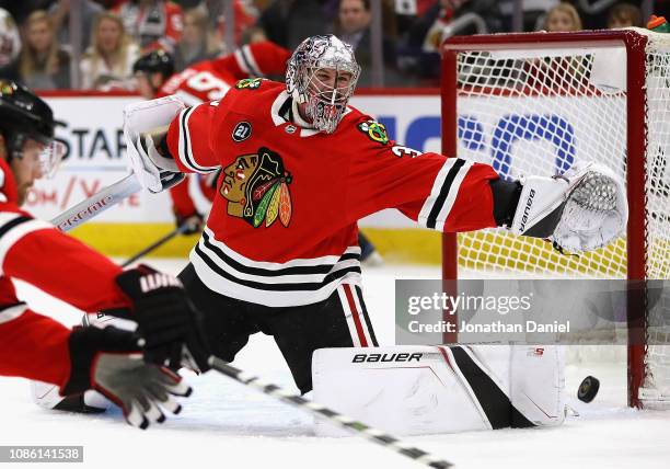 Cam Ward of the Chicago Blackhawks makes a save against the Florida Panthers at the United Center on December 23, 2018 in Chicago, Illinois.