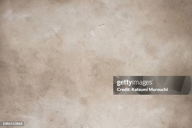 grunge concrete wall texture background - beige background fotografías e imágenes de stock