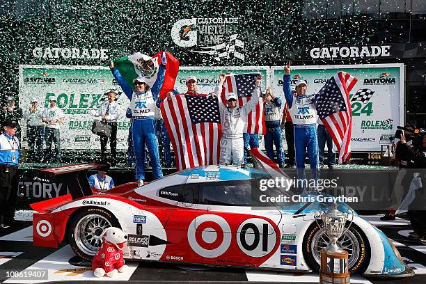 From left, Memo Rojas, Graham Rahal, Joey Hand and Scott Pruett, drivers of the TELMEX/Target Chip Ganassi Racing with Felix Sabates BMW Riley...