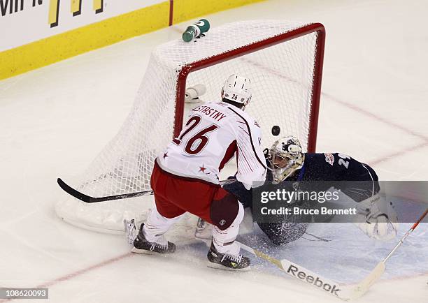 Paul Stastny of the Colorado Avalanche and Team Staal scores a first period goal on Marc-Andre Fleury of the Pittsburgh Penguins and Team Lidstrom in...