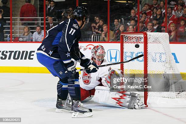 Anze Kopitar of the Los Angeles Kings and Team Lidstrom scores a goal on Cam Ward of the Carolina Hurricanes and Team Staal in the 58th NHL All-Star...