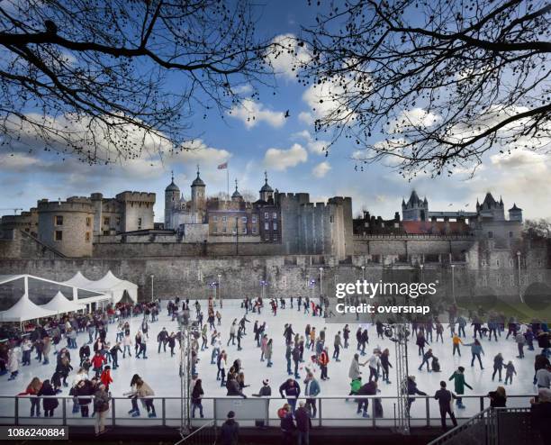 tower of london ice skaters - hampton court palace stock pictures, royalty-free photos & images