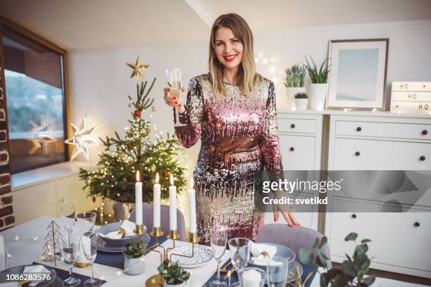 preparing for christmas dinner - woman flashing stock pictures, royalty-free photos & images