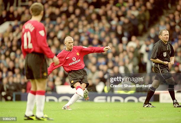 David Beckham scores the winner for Manchester United during the FA Carling Premier League match against Manchester City played at Maine Road in...