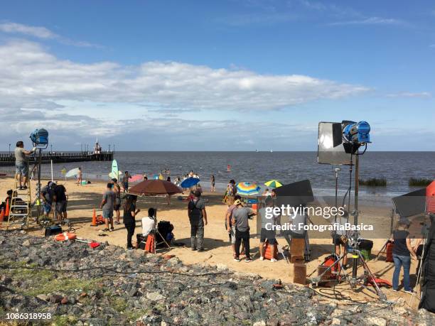 film crew on location shooting advertisement - film set stock pictures, royalty-free photos & images