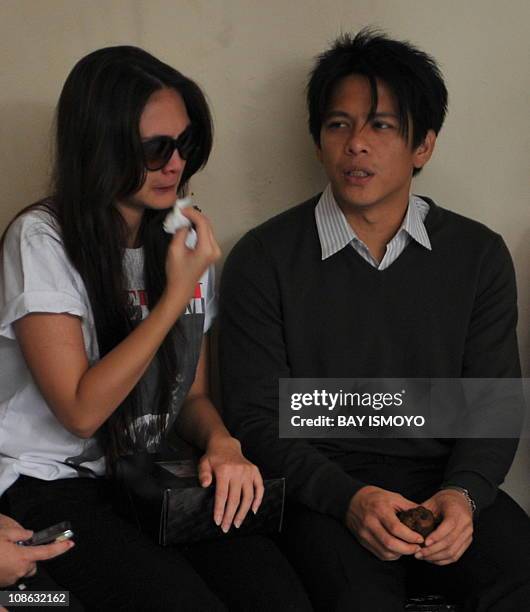 Nazril YEARIndonesian rock star Nazril Ariel waits with his girlfriend Luna ...