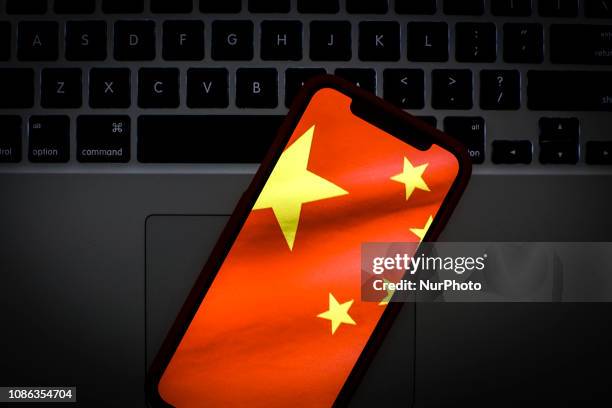 The Chinese flag is seen on a portable mobile device in this photo illustration on January 22, 2019.