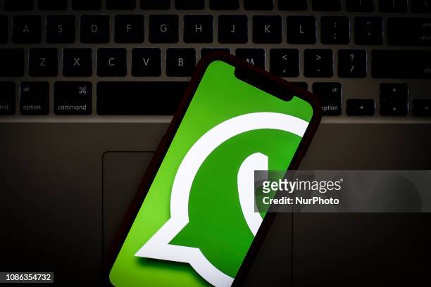 The WhatsApp logo is seen on a portable mobile device in this photo illustration on January 22, 2019.