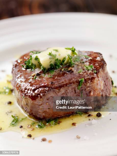 medium rare fillet mignon steak with herb garlic butter - beef stock pictures, royalty-free photos & images