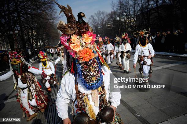 Bulgarian dancers known as a "kukeri" attend a ritual dance during the International Festival of the Masquerade Games in Pernik near the capital...