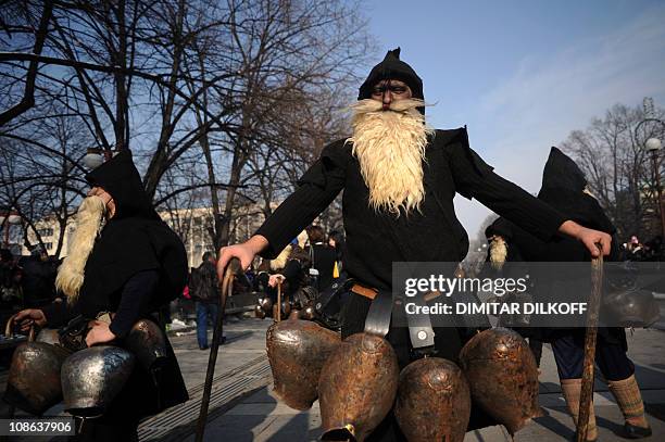 Dancers from Macedonia get ready prior to perform during the International Festival of the Masquerade Games in Pernik near the capital Sofia, on...