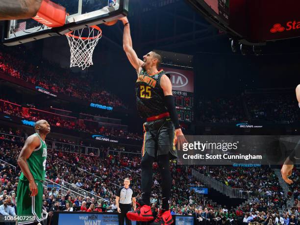 Alex Len of the Atlanta Hawksl dunks the ball against the Boston Celtics on January 19, 2019 at State Farm Arena in Atlanta, Georgia. NOTE TO USER:...