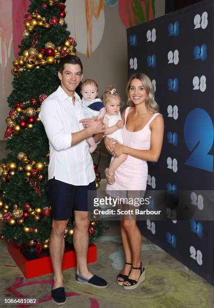 Australian captain Tim Paine along with his children Milla and Charlie and his wife Bonnie Maggs pose next to a Christmas tree during an Australian...