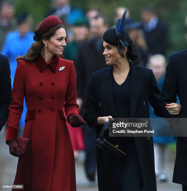 Catherine, Duchess of Cambridge and Meghan, Duchess of Sussex arrive to attend Christmas Day Church service at Church of St Mary Magdalene on the...