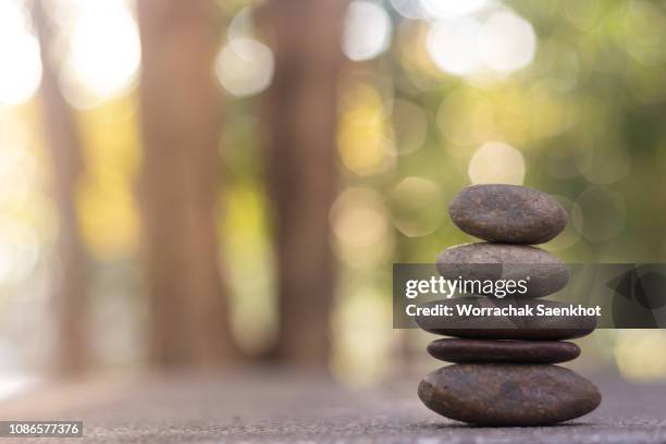 stone stacked for spa on natural background. - zen stone stock pictures, royalty-free photos & images