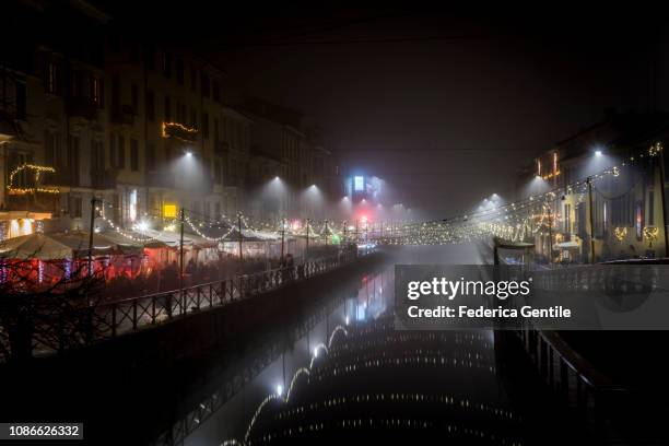 naviglio grande at christmas time - milano navigli stock-fotos und bilder