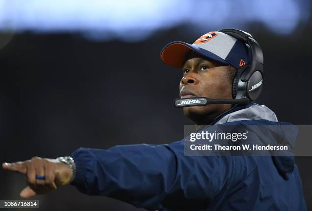 Head coach Vance Joseph of the Denver Broncos looks on from the sidelines against the Oakland Raiders during their NFL football game at the...