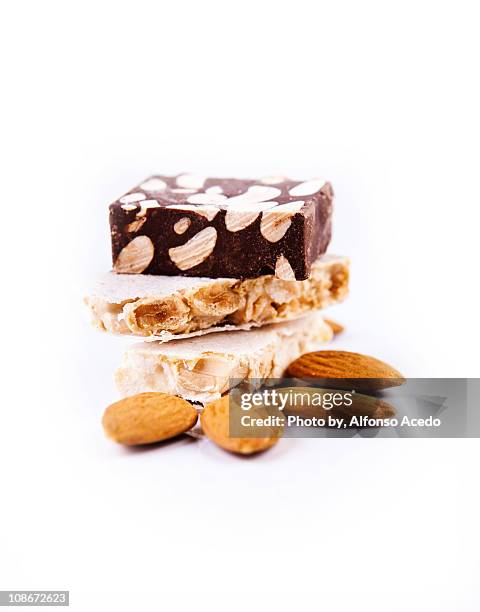 alicante nougat and chocolate almond nougat - nougat stock-fotos und bilder