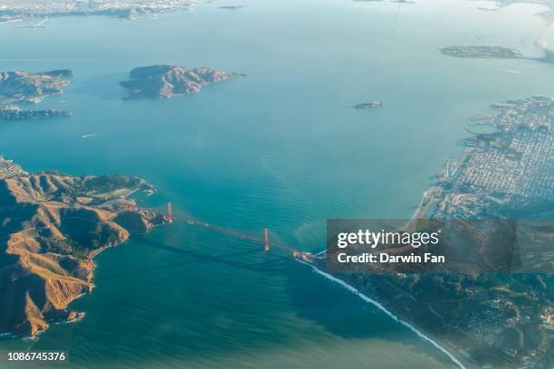 golden gate bridge aerial - san francisco california aerial stock pictures, royalty-free photos & images