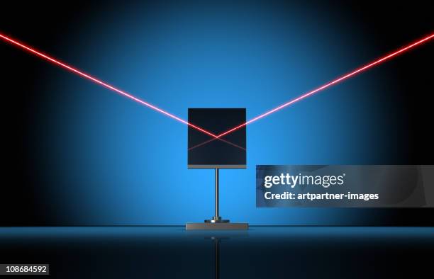 red laser beam with mirror - laser imagens e fotografias de stock