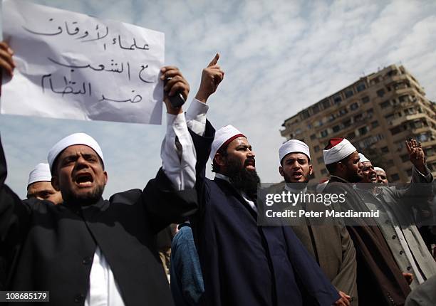 Muslim men demonstrate in Tahrir Square on February 1, 2011 in Cairo, Egypt. The Egyptian army has said it will not fire on protestors as they gather...