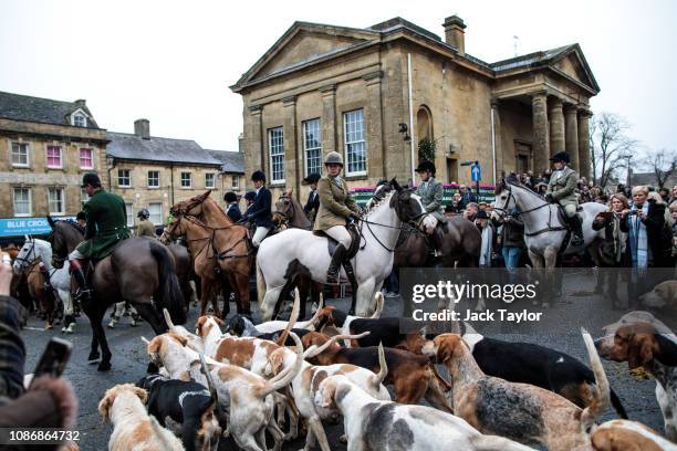 Riders of the Heythrop Hunt prepare to leave Chipping Norton town centre on Boxing Day on December 26, 2018 in Oxfordshire, England. Despite the 2004...